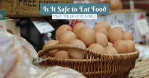 Basket filled with fresh brown free-range eggs at a farmer’s market, surrounded by bread and local produce.